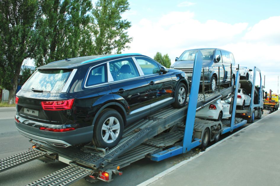 Cars being transported on the back of a lorry
